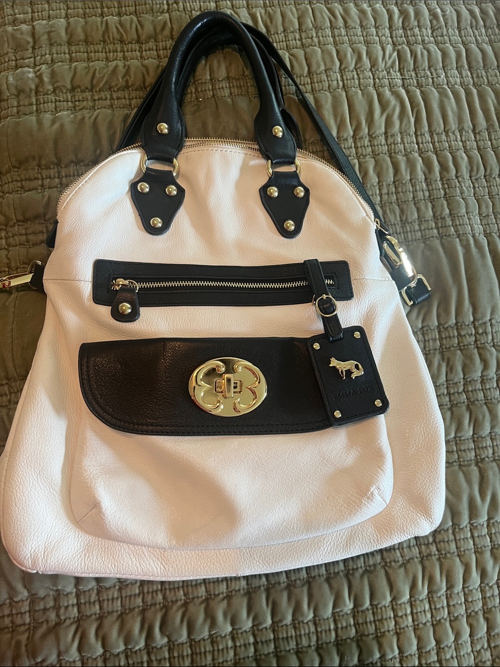 Emma Fox, white leather bag
